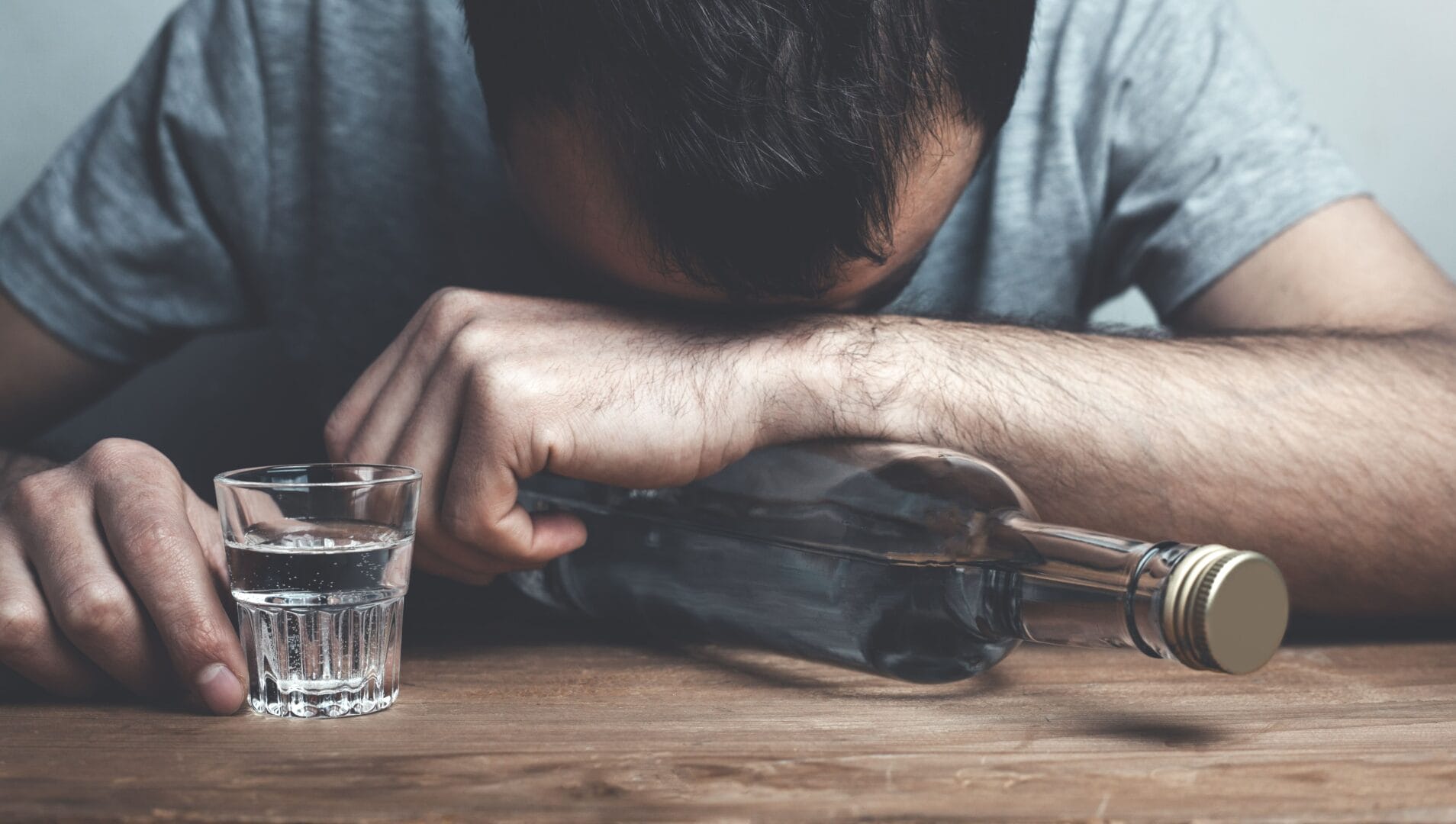 alcoholic man drinking vodka