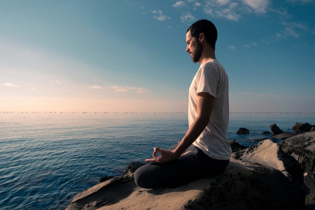 man practicing meditation