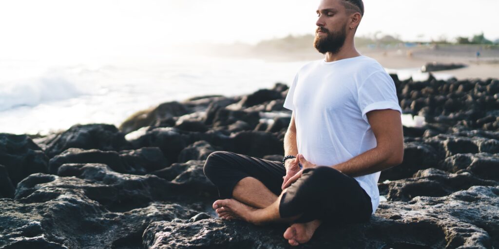 man in recovery meditating